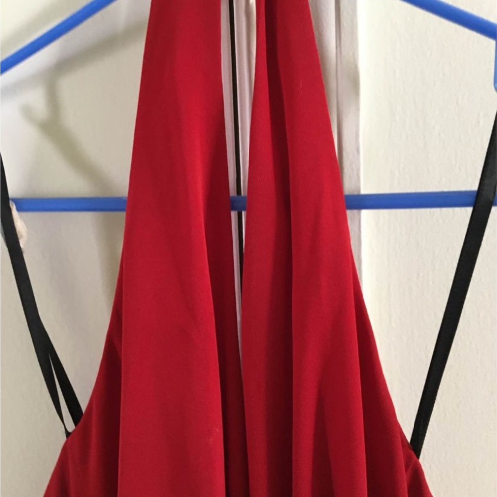 Ladies size 2, cache, red halter neck gown with Crystal buckle and front slit